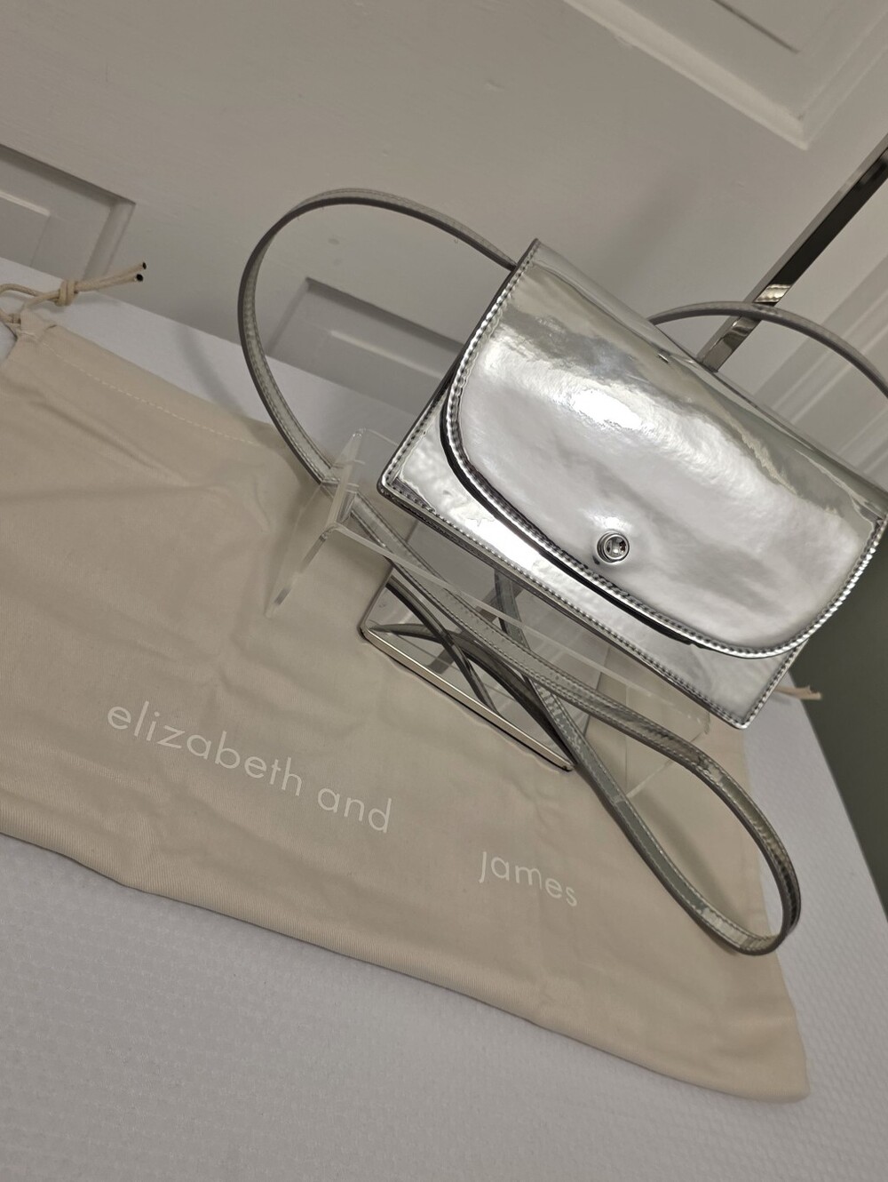 Elizabeth and James Metallic Silver Crossbody Bag